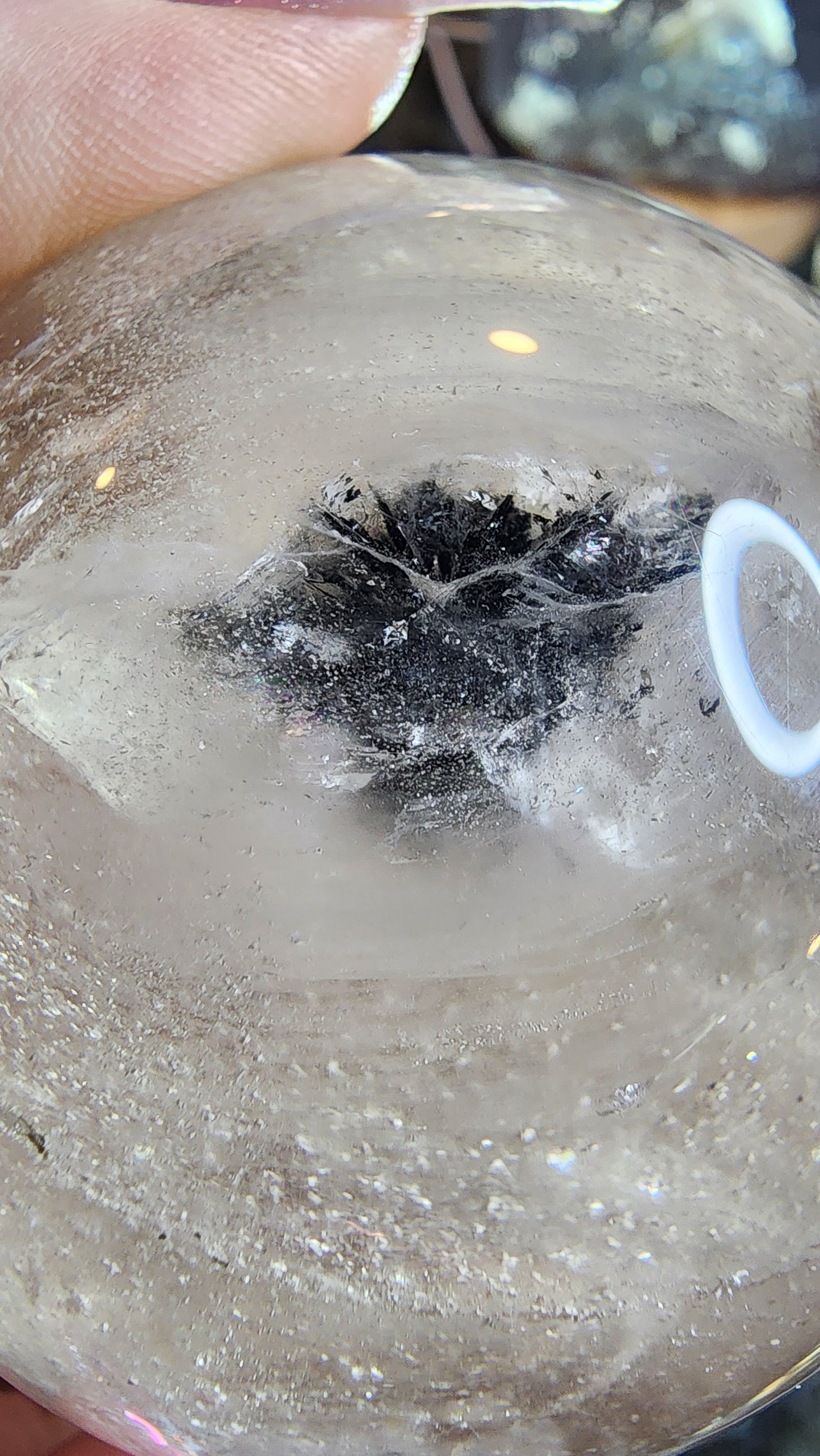 538g Clear Quartz Sphere with Rainbow and Specularite A145