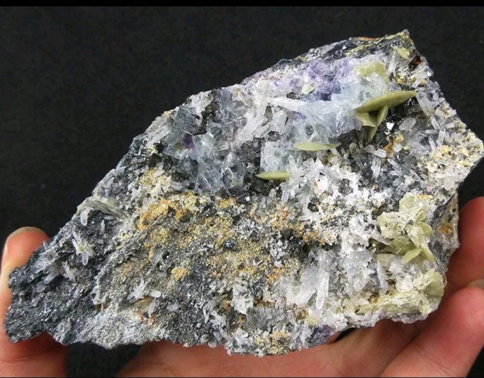 Blue/purple Fluorite, Bismuthite hair, Siderite, Arsenopyrite, Pyrite and Galena