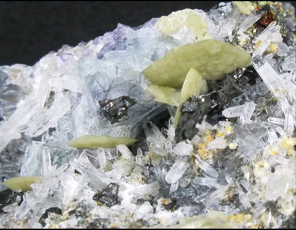 Blue/purple Fluorite, Bismuthite hair, Siderite, Arsenopyrite, Pyrite and Galena