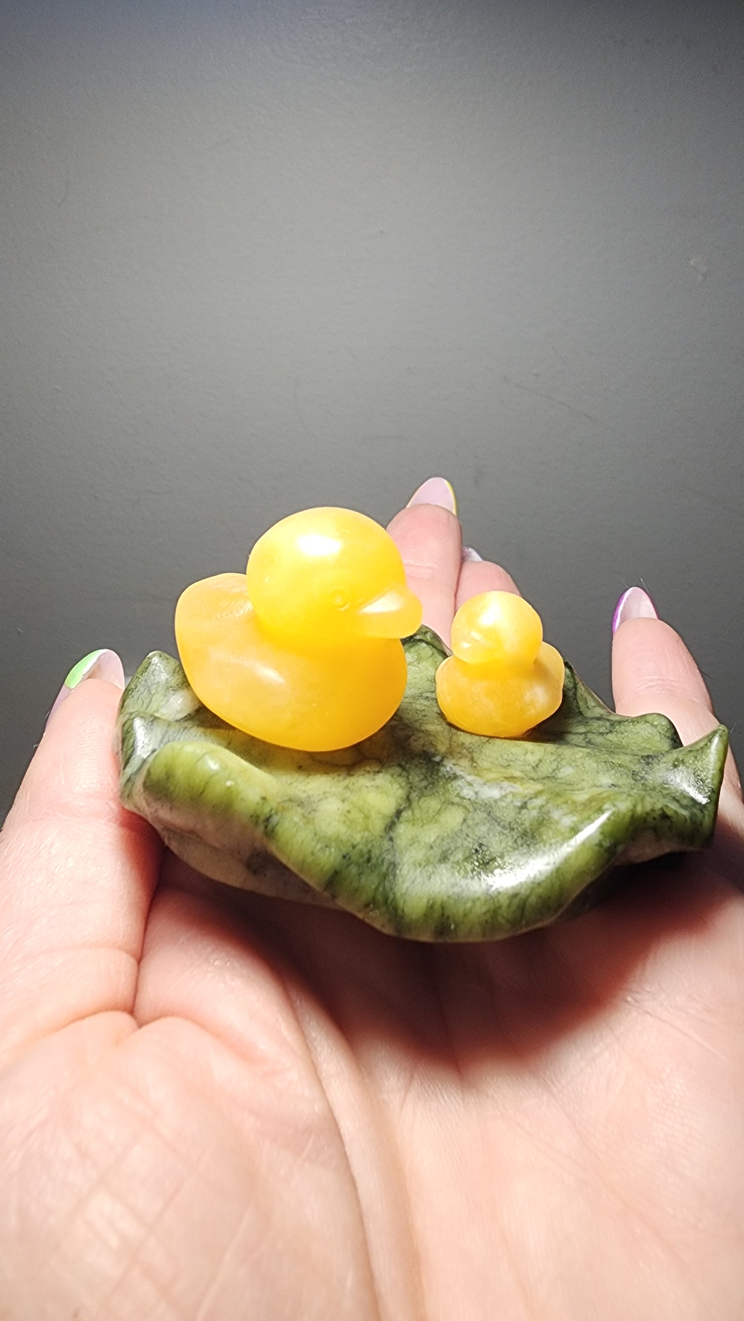 Calcite Duckies on Serpentine Lily Pad Carving